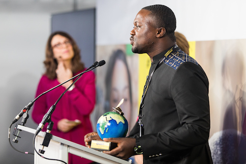 Ghana journalist with me in background