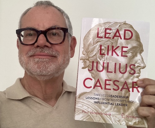 Paul Vanderbroeck with book