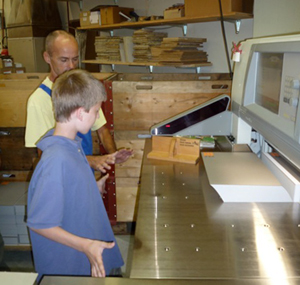 Steven cutting at printers